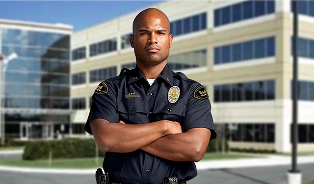 Security man with crossed arms stands in front of building using the MobiWork alarm & security services software solution